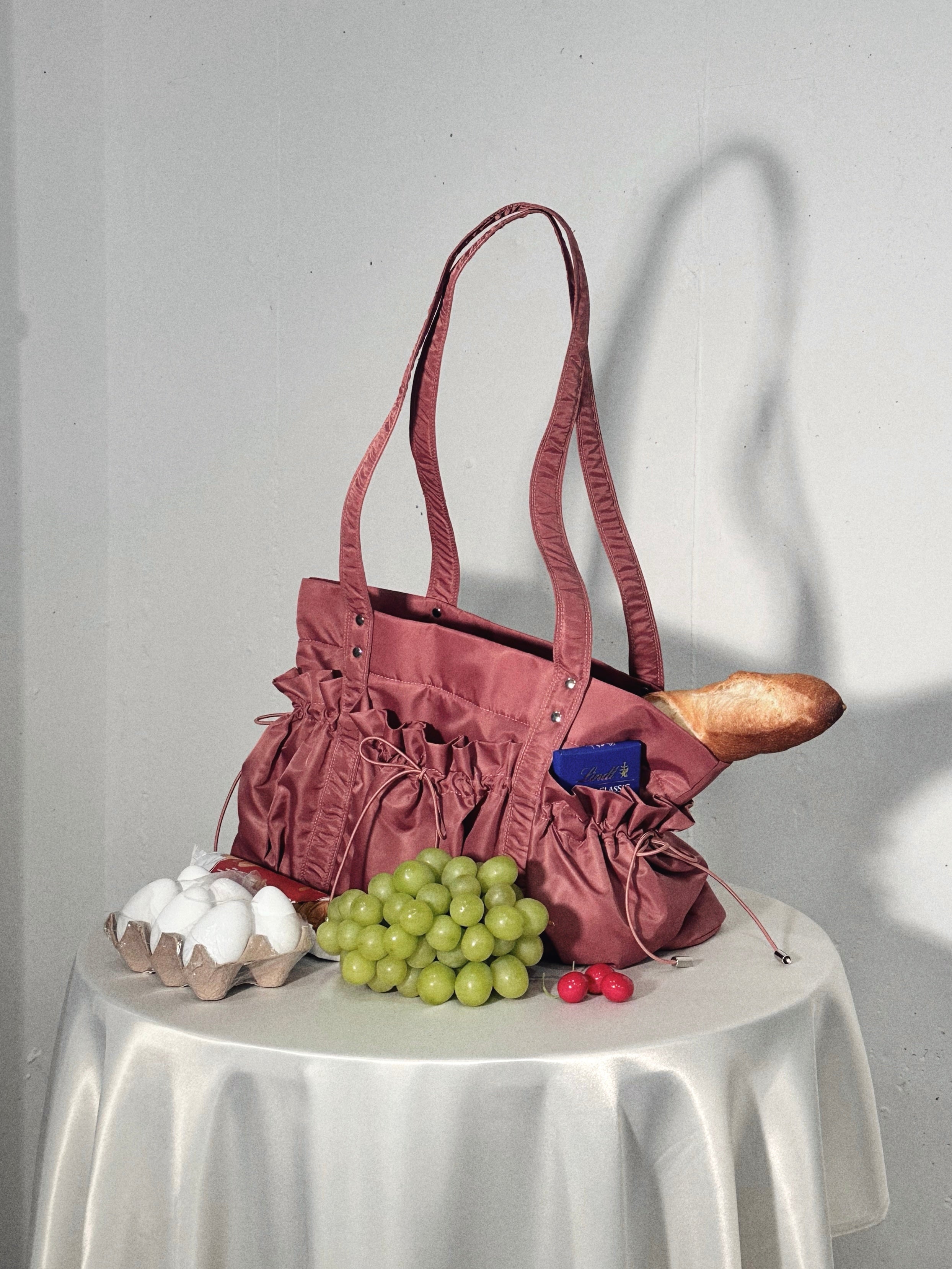 Drawstring pocket puffer bag (rose)