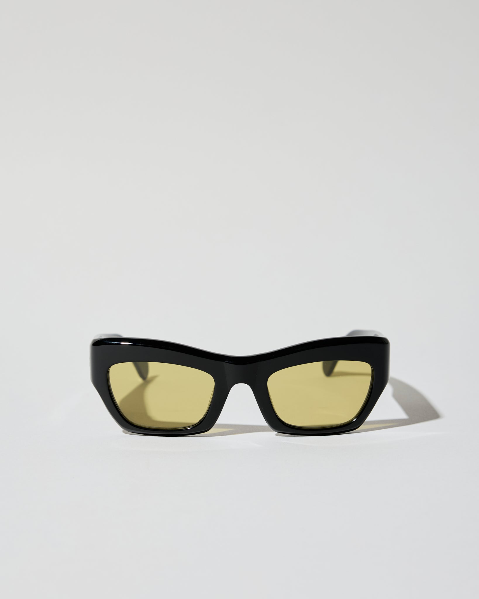 Ayreen in black acetate with warm olive lens
