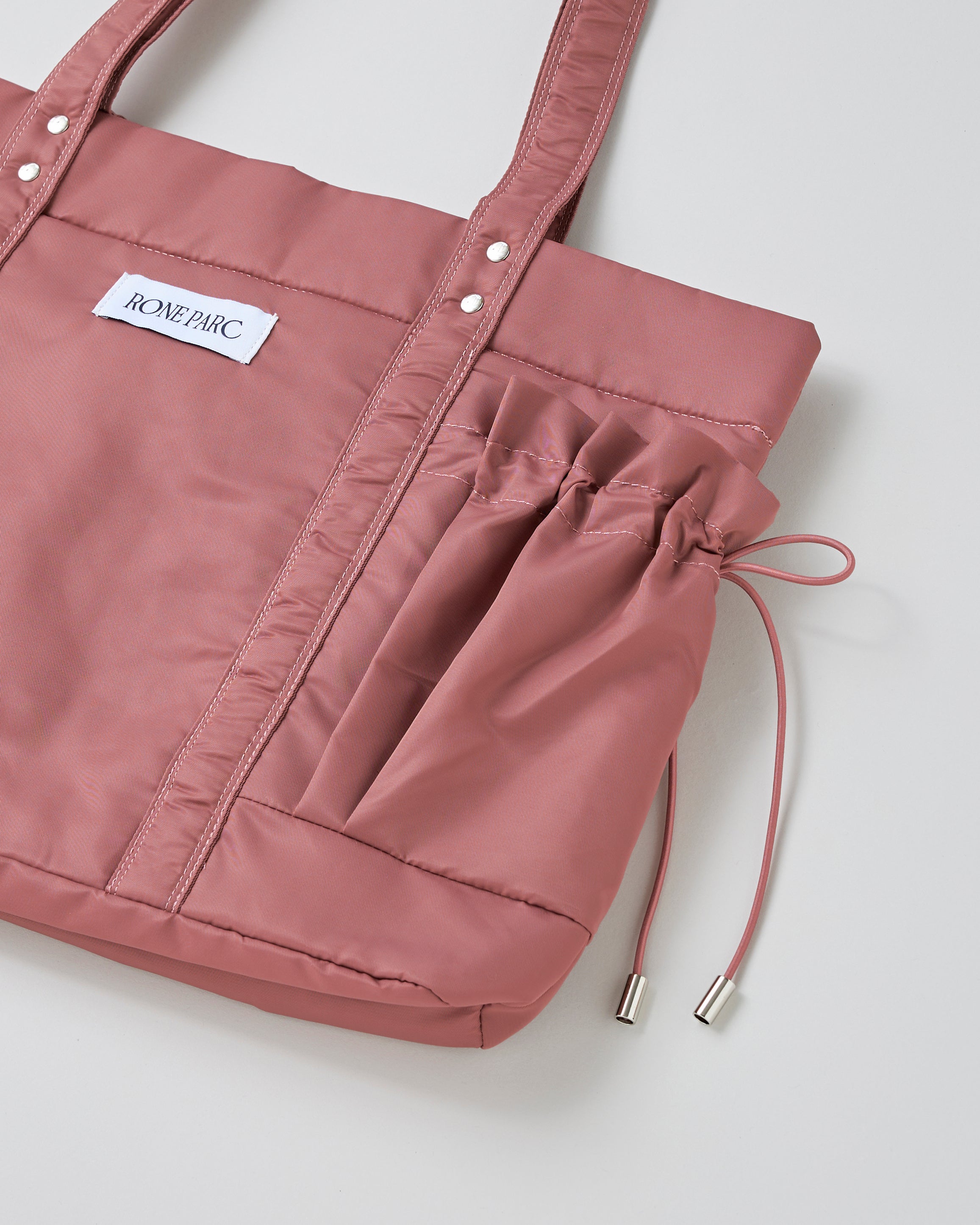 Drawstring pocket puffer bag (rose)