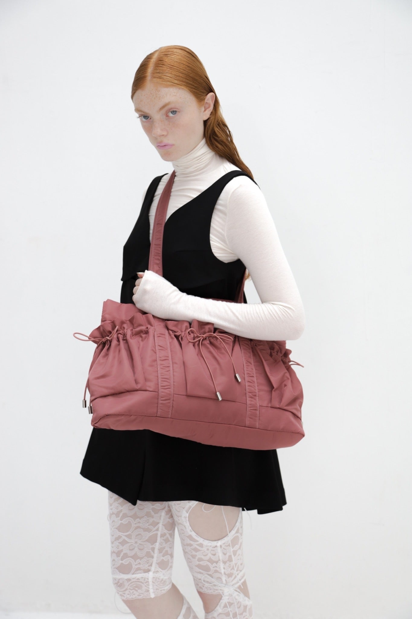 Drawstring pocket puffer bag (rose)